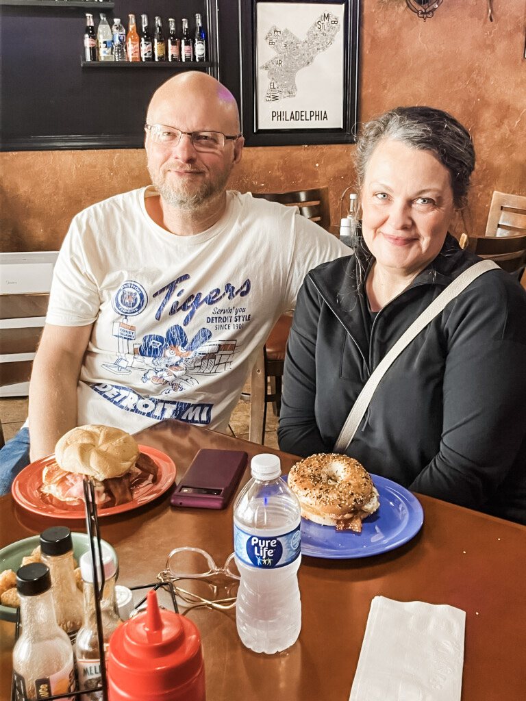 A couple enjoying lunch at Sak's Deli