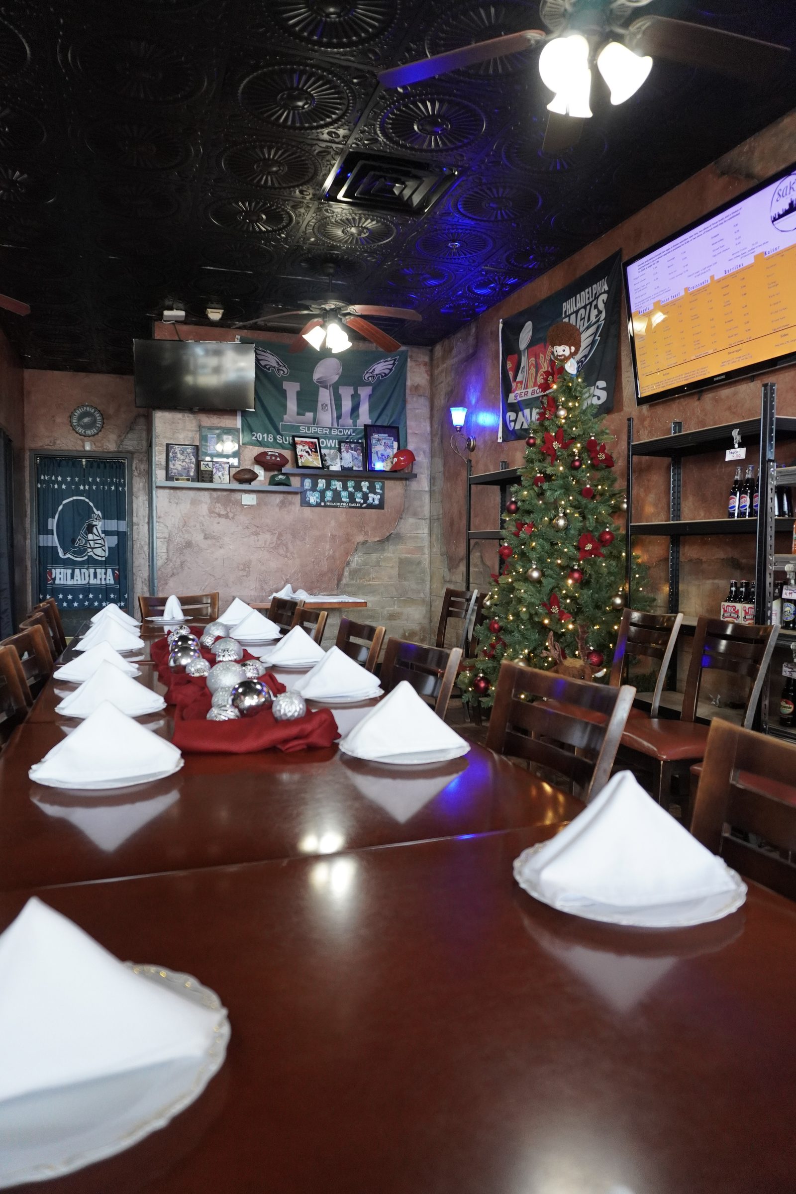 Table set for a holiday party at Sak's Deli
