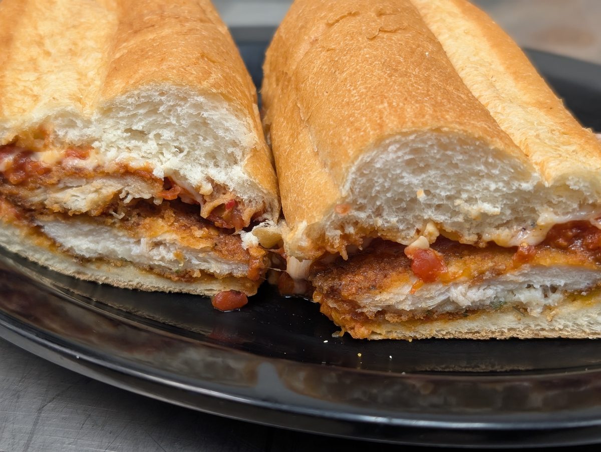 Chicken parm sub with a cheese pull at Sak's Deli