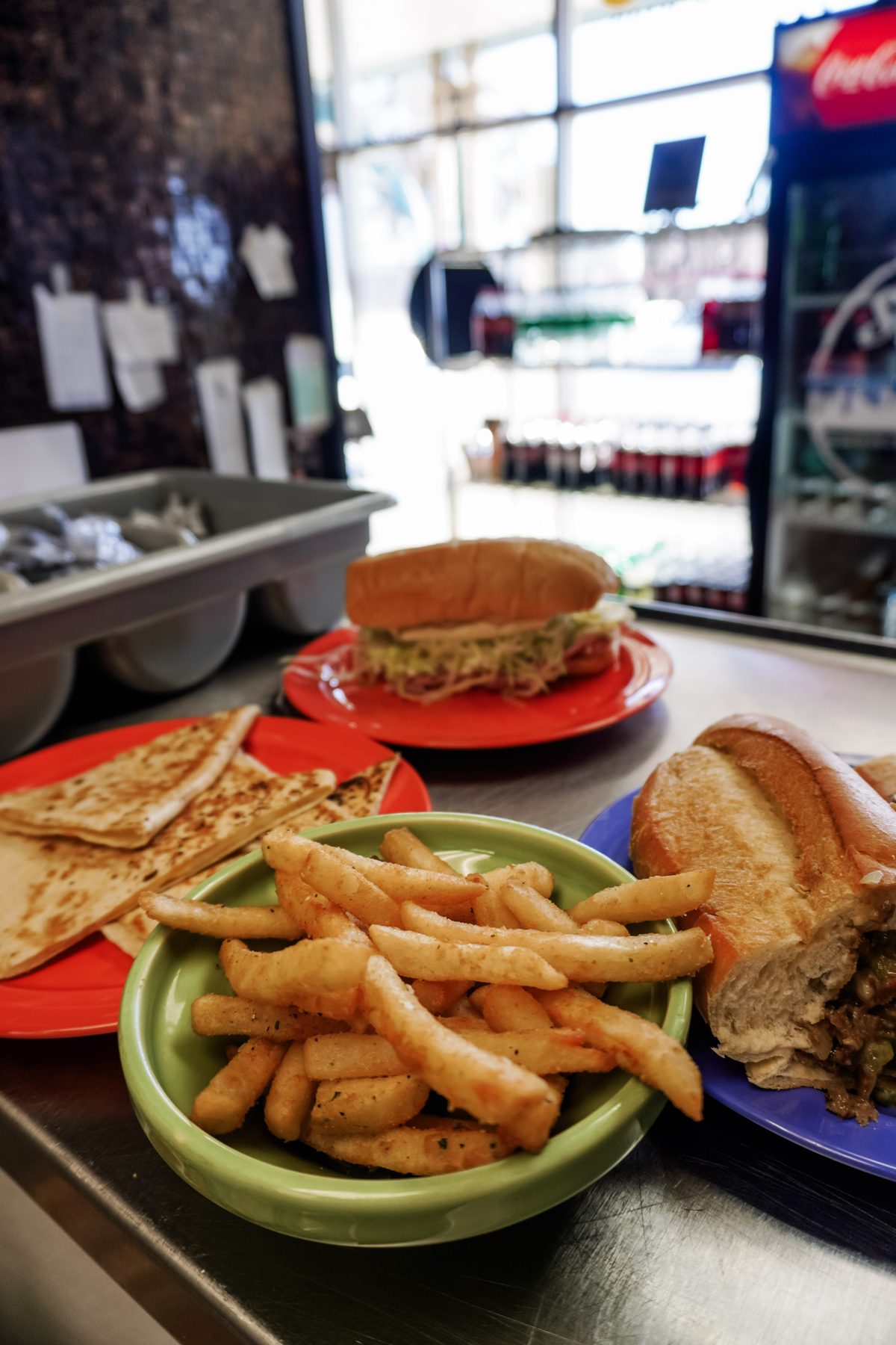 A spread of cheesesteaks, hoagies and fries at Sak's Deli