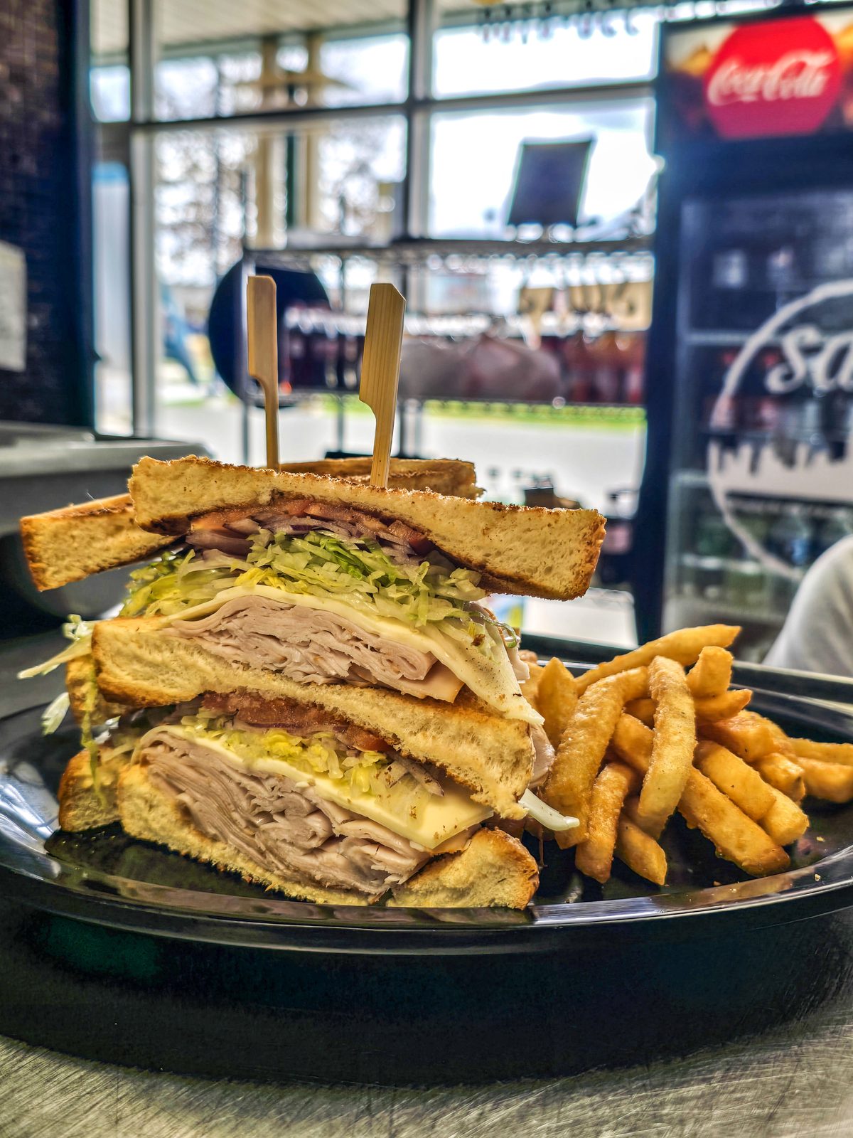 Turkey club with fries at Sak's Deli