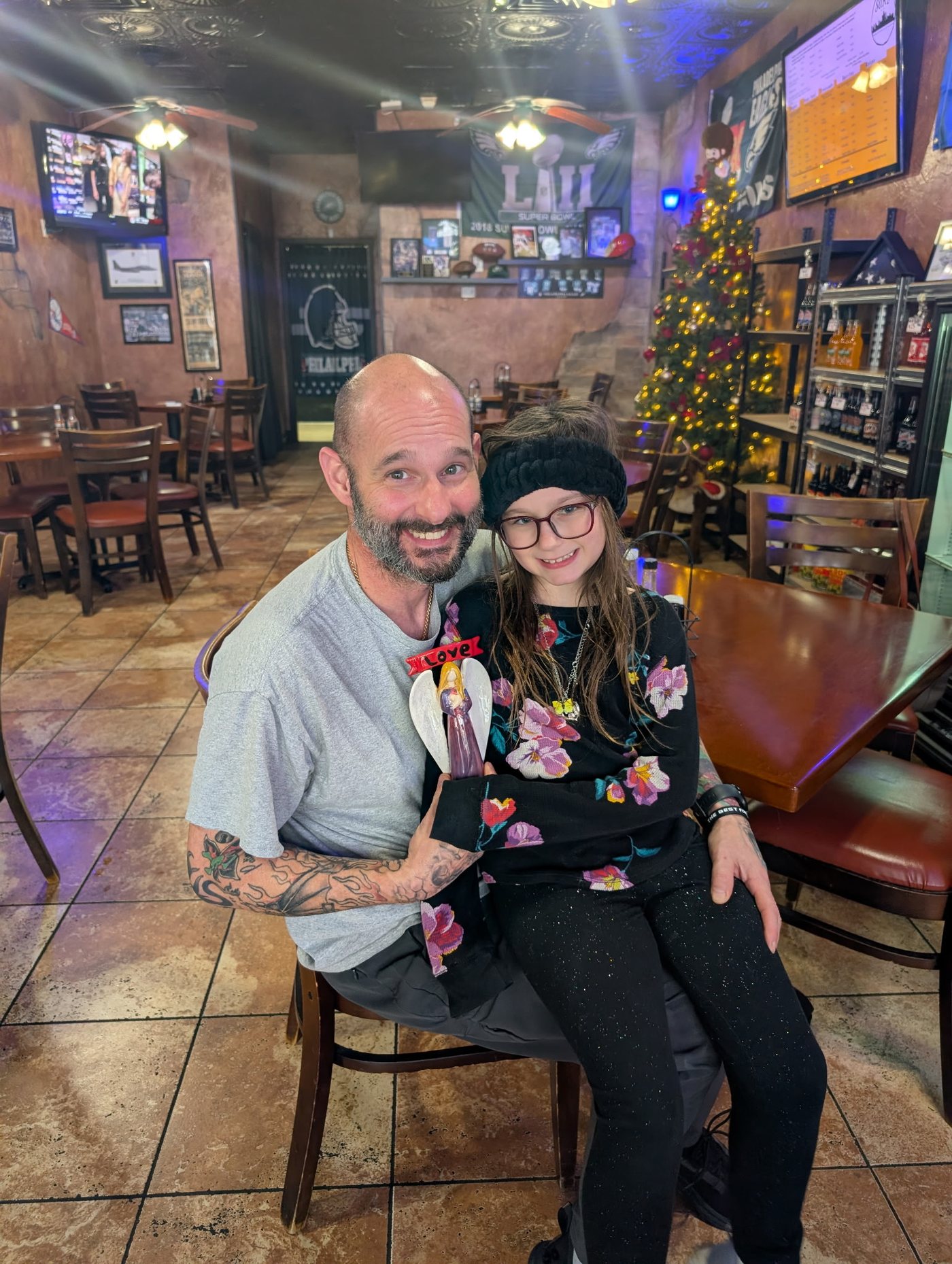 Matt with a young guest at Sak's Deli